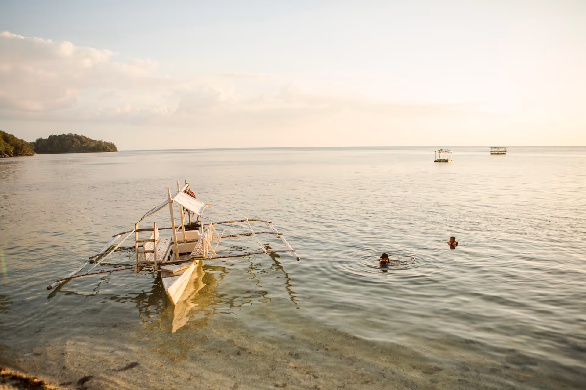 A boat on Danjugan's shore, photo by Geric Cruz
