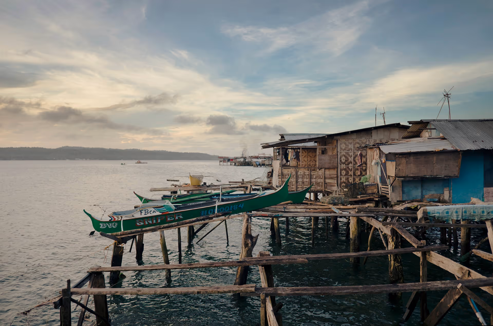 Badjao houses on stilts with their boats 
