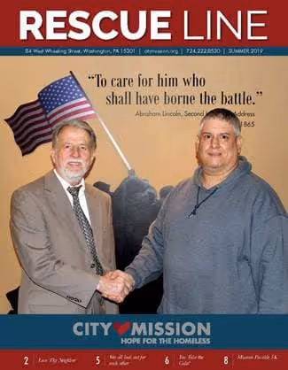 Resident Kevin shaking hands with Dr. Crabtree