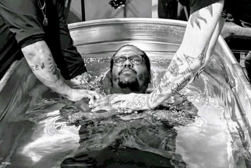 John, a City Mission resident, getting baptized.