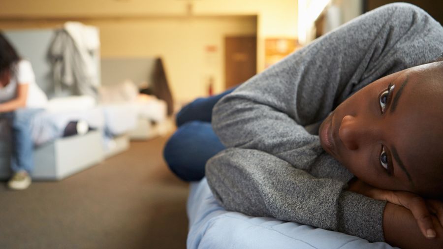Woman Sleeping At Shelter