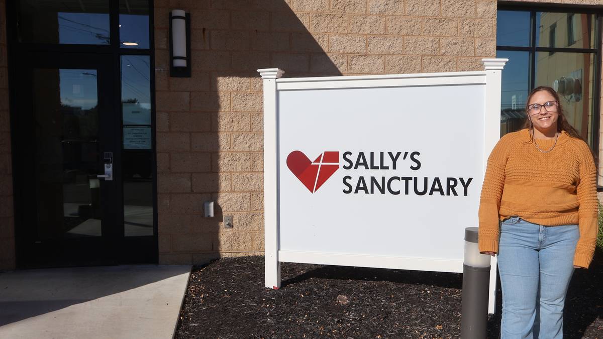 Stephanie standing outside of the Sally's Sanctuary at City Mission.
