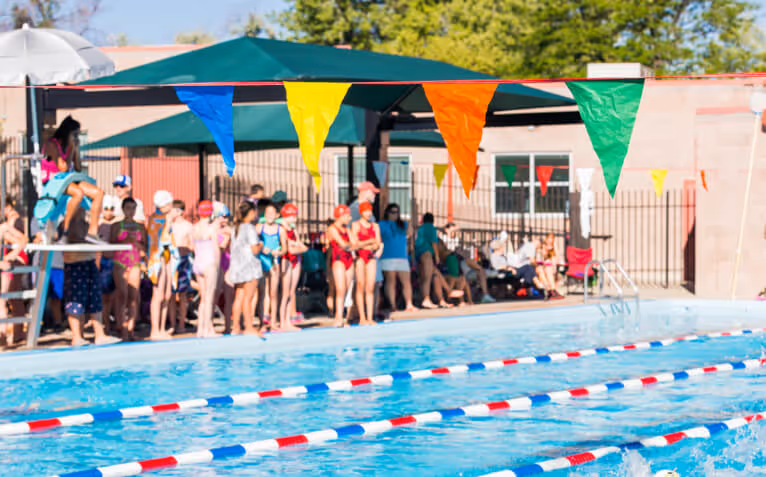 group of women doing yoga in rec center