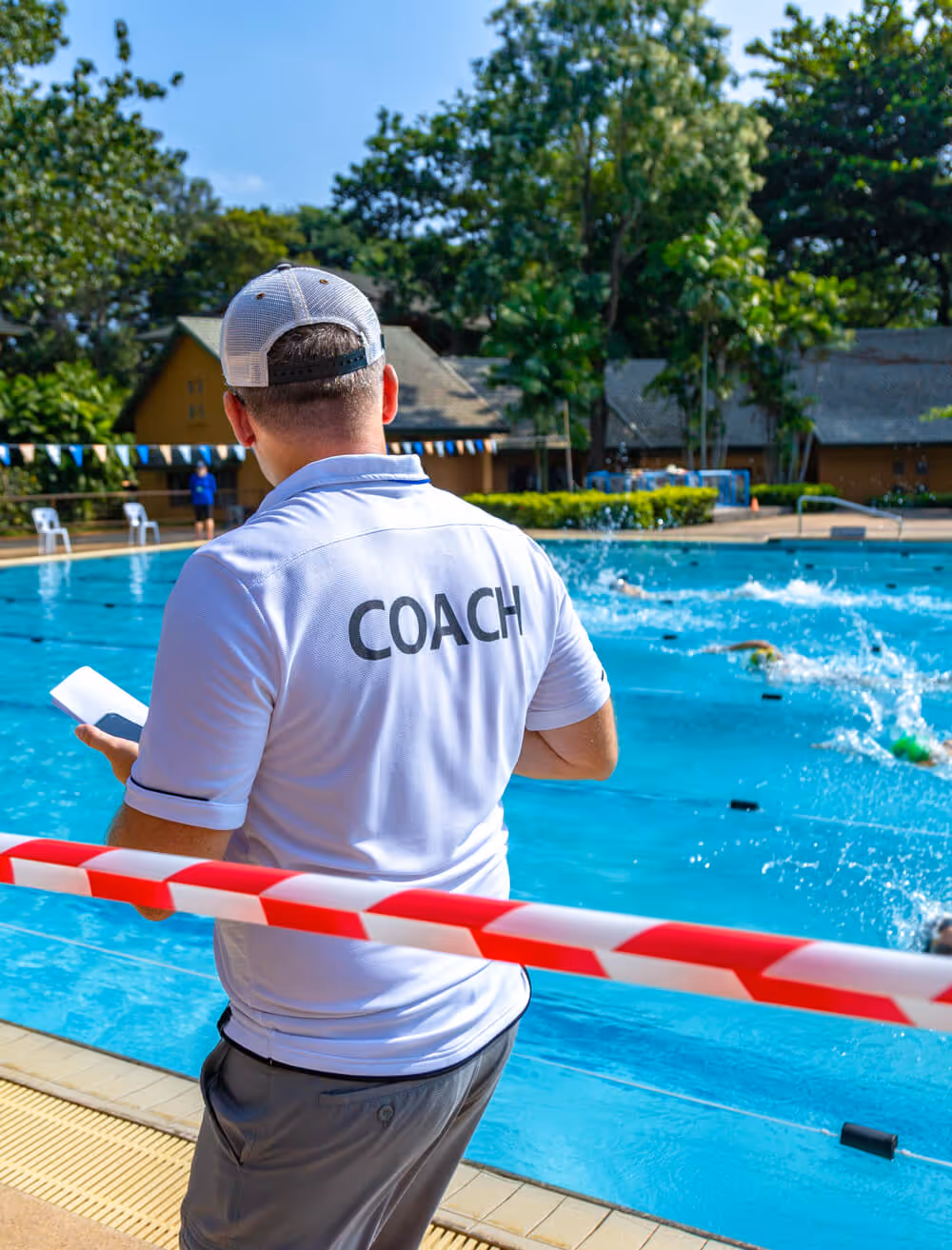 women at rec center front desk greeting members