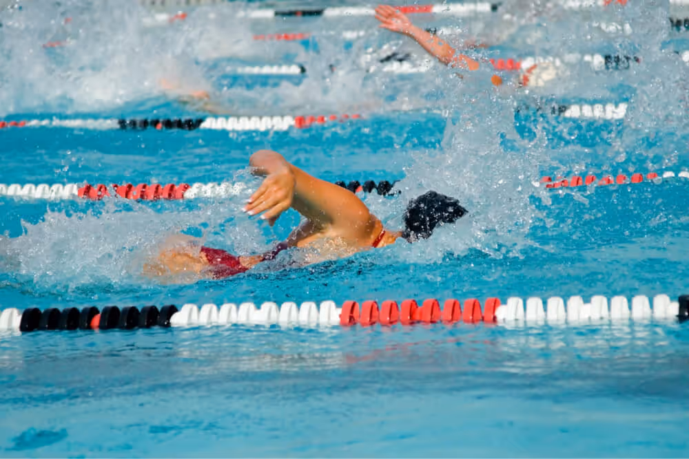 women lifting weights at rec center
