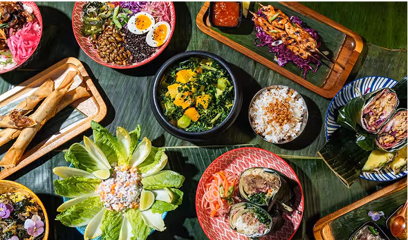 A table topped with lots of different types of food.