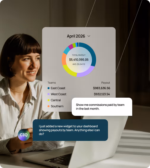 Woman smiling at a laptop screen displaying a dashboard widget showing April 2026 team payouts, with a pie chart and commission amounts for East Coast, West Coast, Central, and Southern teams.