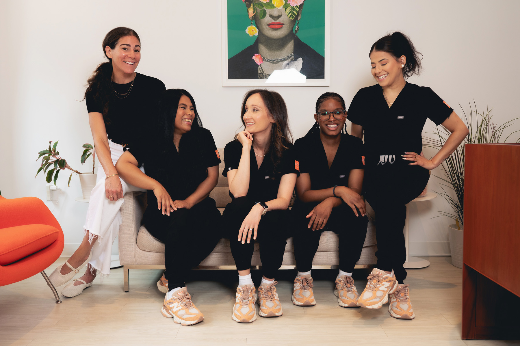 Photo of Dr. Lilya and two team members standing in a stairwell