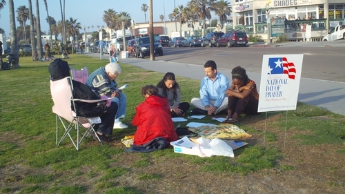 Group of Ocean Beach (California) citizens participating in a National Day of Prayer activity near the Beach coordinated through the local church partners.
