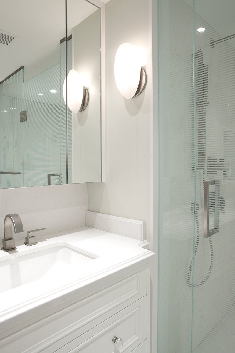Bay Street Condo: The finished project incorporated generous storage, extensive millwork and room for a museum quality art collection