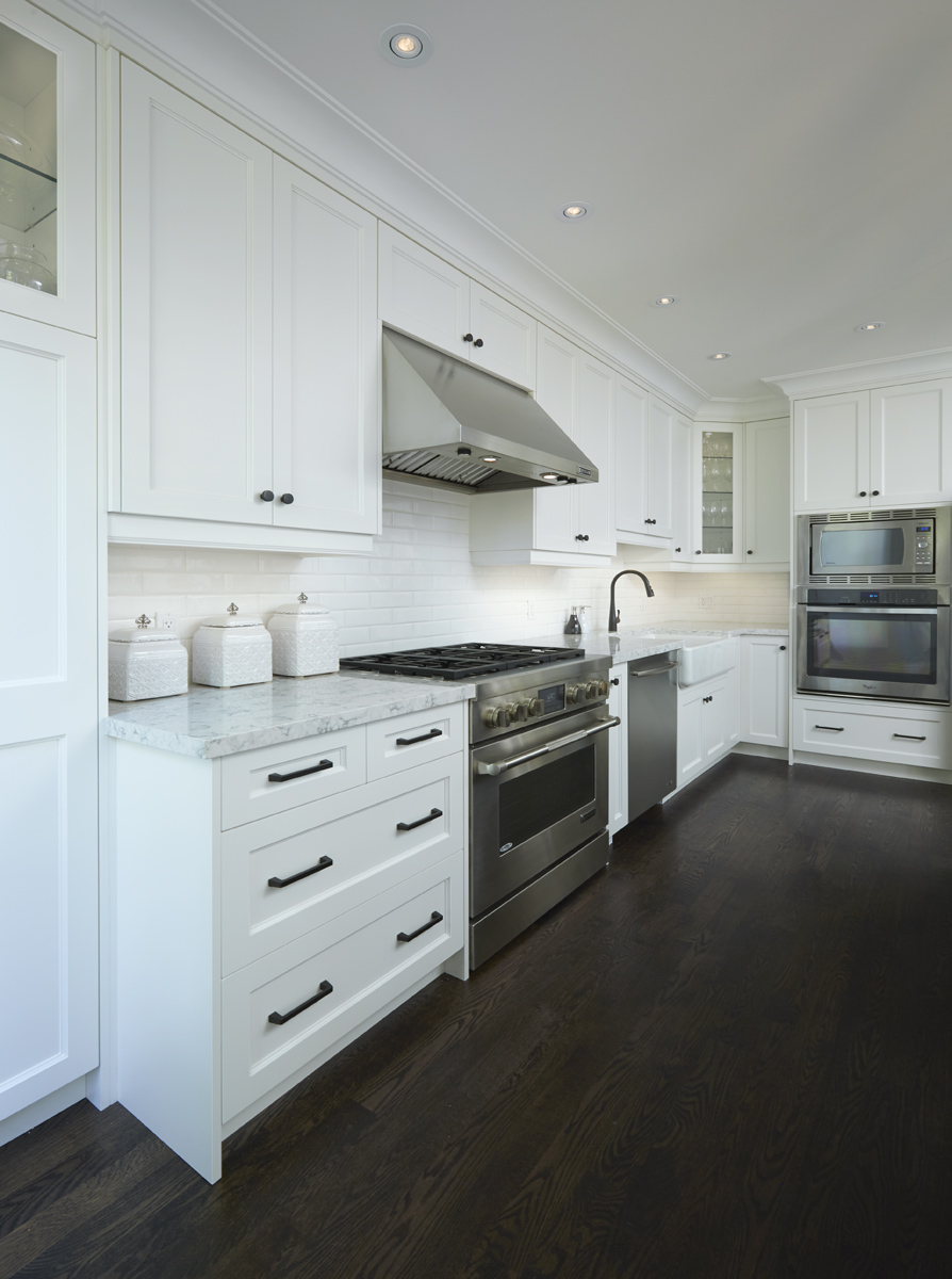 Bloor West Village: This was achieved using a carefully selected window package, hardwood floors and bathroom fixtures and fittings with a nod to the past