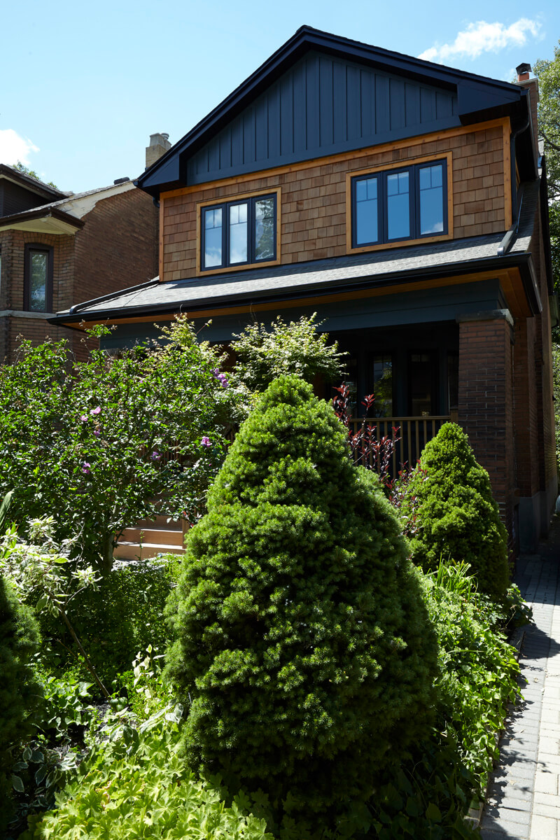 Bloor West Village: Atttention to details included a warm and welcoming ‘Irish’ kitchen with a fireplace and wood top island that allowed room for cookbooks