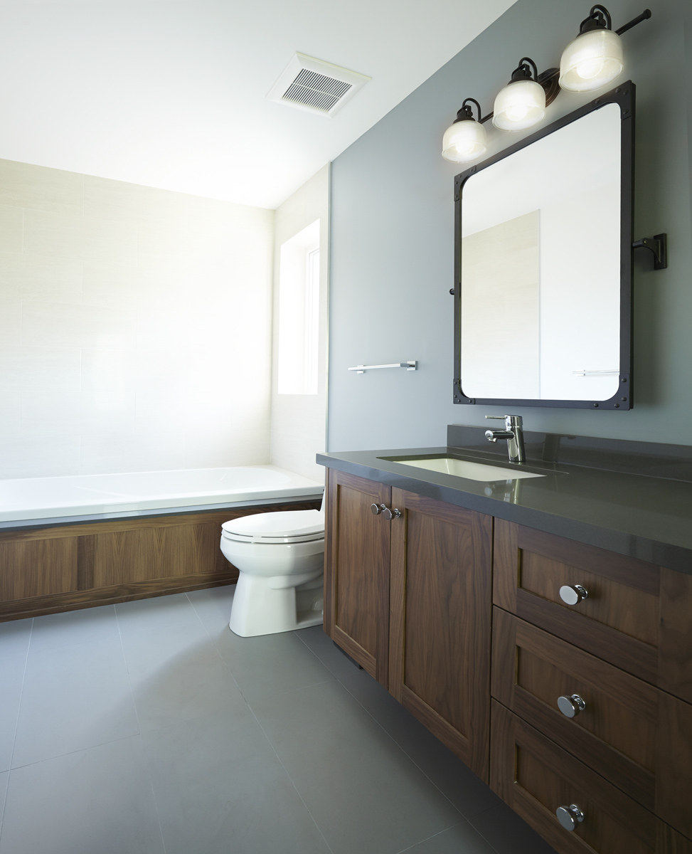 Bloor West Village: This was achieved using a carefully selected window package, hardwood floors and bathroom fixtures and fittings with a nod to the past