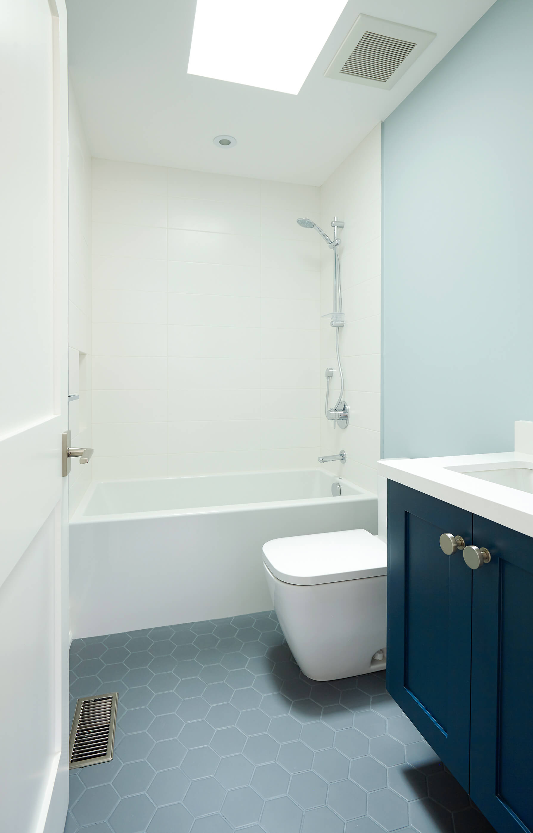 Bedford Park: Combining both, it was decided that the island would include picture-frame skirting with a 3-inch profile and a 2-inch Caesarstone profile for the countertop
