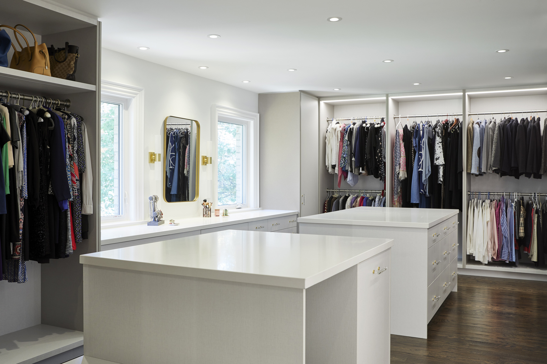 Humber Valley Village: The kitchen was totally reimagined and designed to incorporate all of the clients needs from and oversized panel ready Sub Zero, spacious island with prep sink and wine storage, floor to ceiling pantry, endless drawer space,…