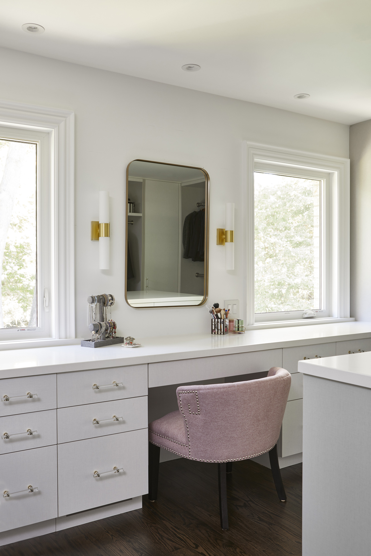 Humber Valley Village: The powder room cleverly utilized leftover marble from the kitchen to create a custom floating vanity for the powder to great effect