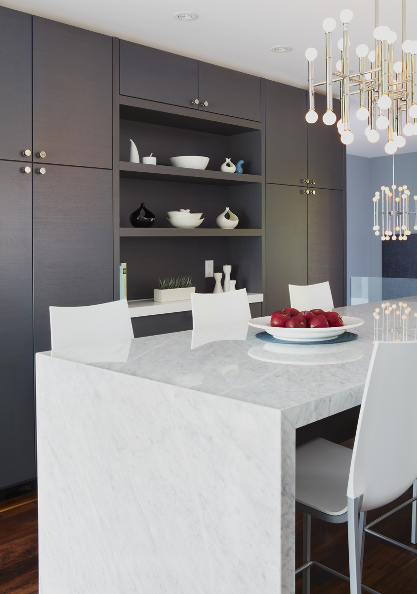West Toronto: The transformation of a 1973 flat roof split level bungalow into a mid-century modern inspired family home