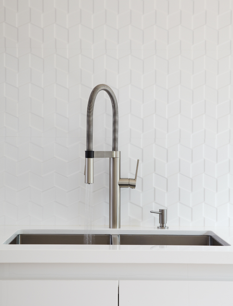 High Park: A combination of a modern kitchen with walnut flooring grounded the space