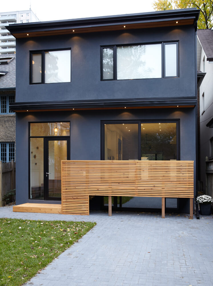 High Park: The walnut waterfall staircase and frameless glass helped complete the new space