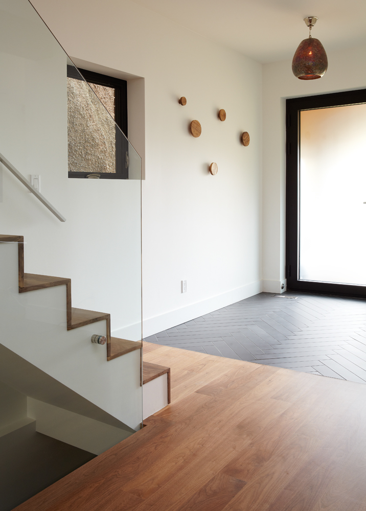 High Park: This project involved a major underpin to create a very useful 8' lower level plus adding a rear two storey addition and opening the floor plan