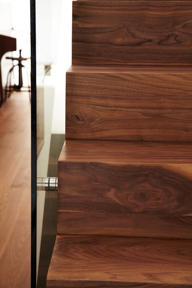 High Park: A combination of a modern kitchen with walnut flooring grounded the space