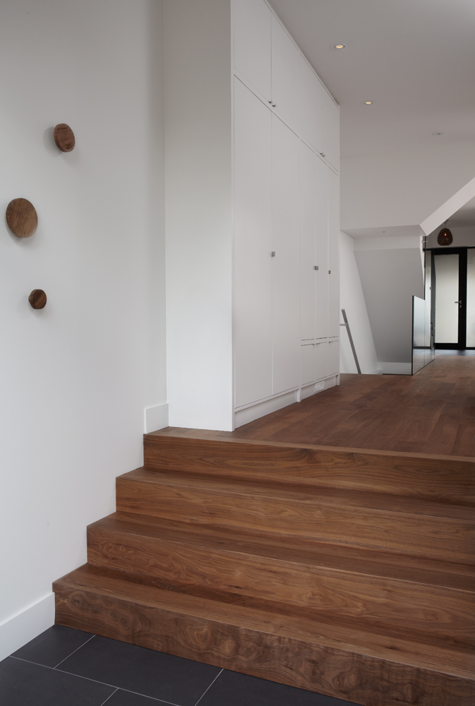 High Park: This project involved a major underpin to create a very useful 8' lower level plus adding a rear two storey addition and opening the floor plan