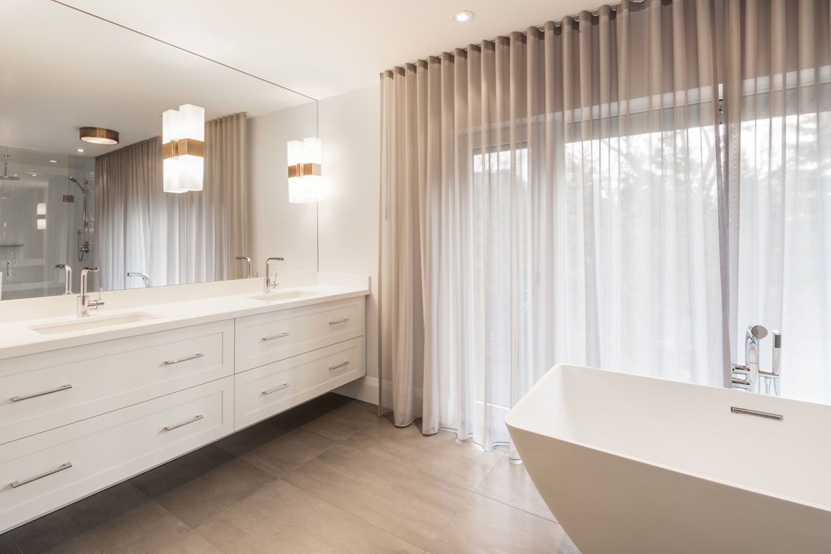 Sherwood Park: Added features included the master where room was found for his and hers walk-in closets and an open concept bathroom with views for miles!