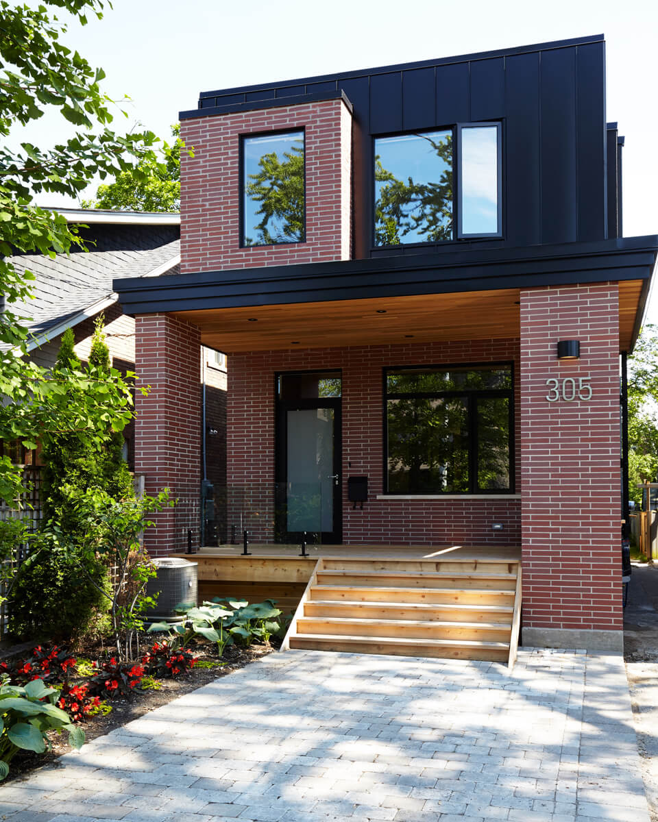 North Toronto Revived: Warm walnut floors and well thought out custom millwork serve to delineate the main floor areas and allow for ample storage space