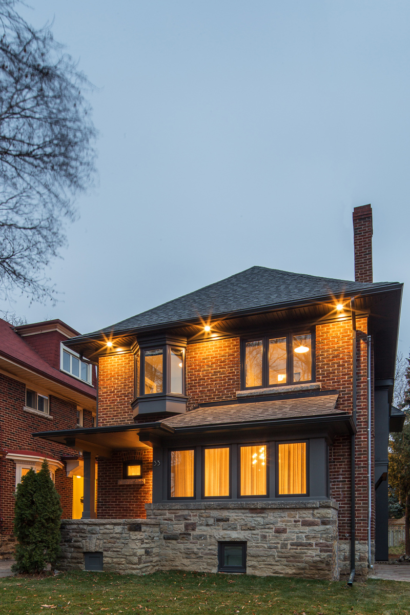 Sherwood Park: Features include heightened ceilings on the main, a light filled white and navy kitchen with a 14ft built in sofa for lounging and room for an 8 person dining table, and bar with a Moose rack no less!