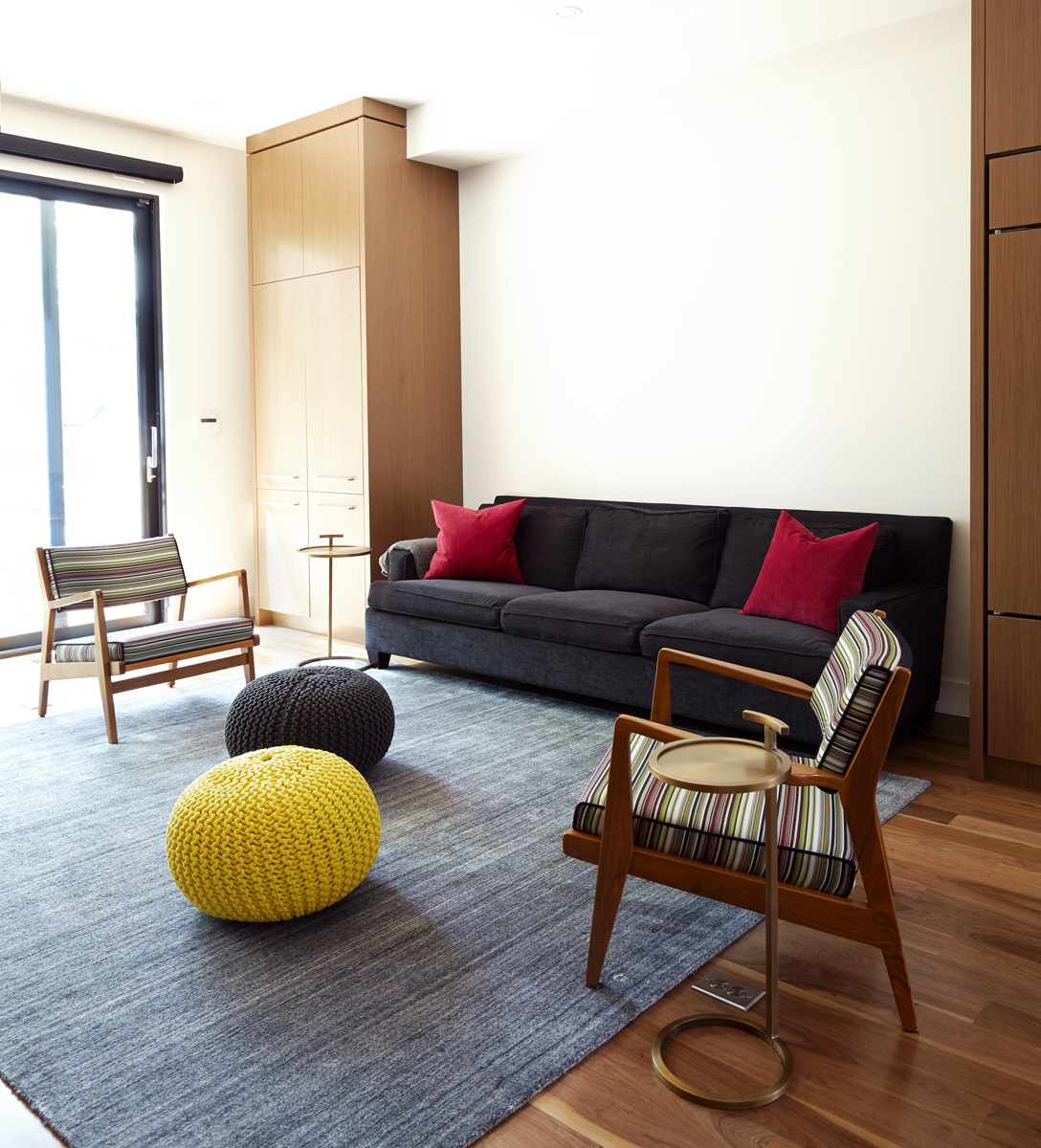 North Toronto Revived: Warm walnut floors and well thought out custom millwork serve to delineate the main floor areas and allow for ample storage space
