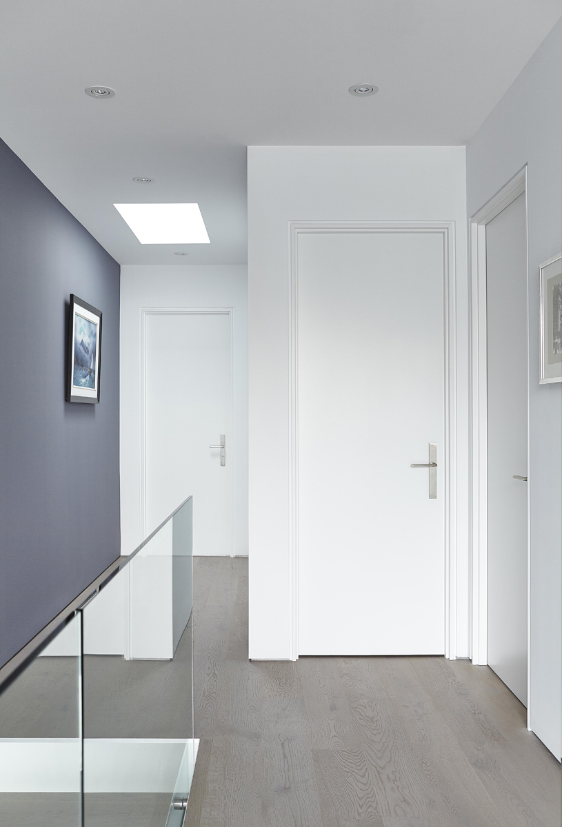 Swansea: Features included 14 ft ceilings on the main, high gloss kitchen millwork and a Caesarstone clad fireplace plus 22 ft curtain window for the living room