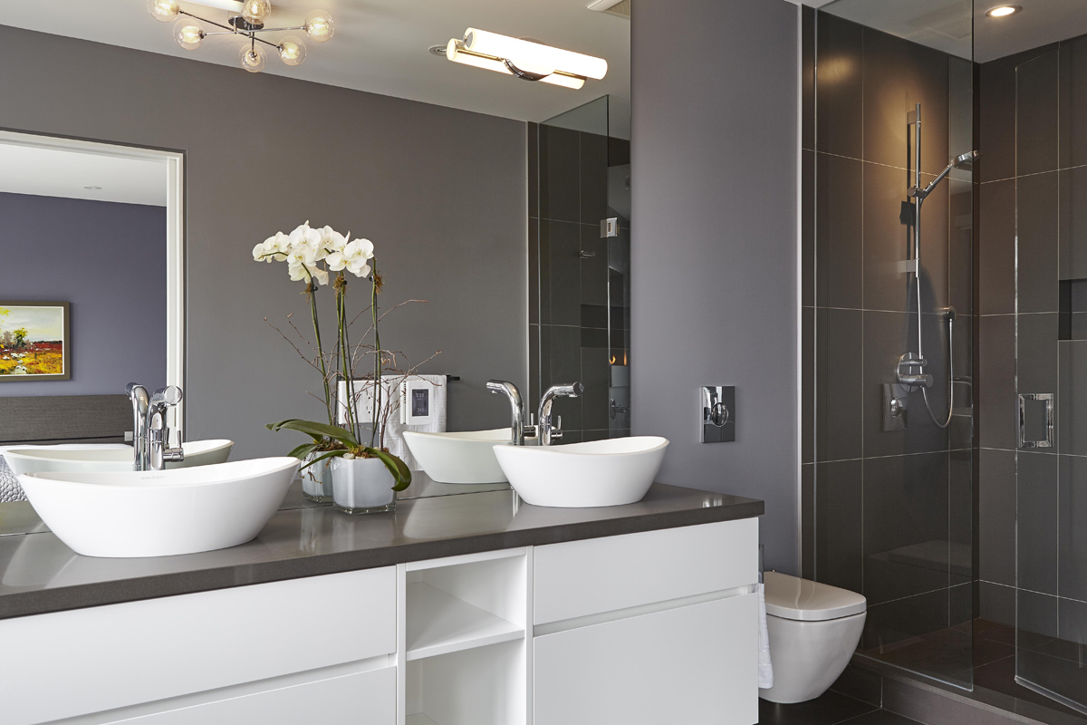 Swansea: Features included 14 ft ceilings on the main, high gloss kitchen millwork and a Caesarstone clad fireplace plus 22 ft curtain window for the living room