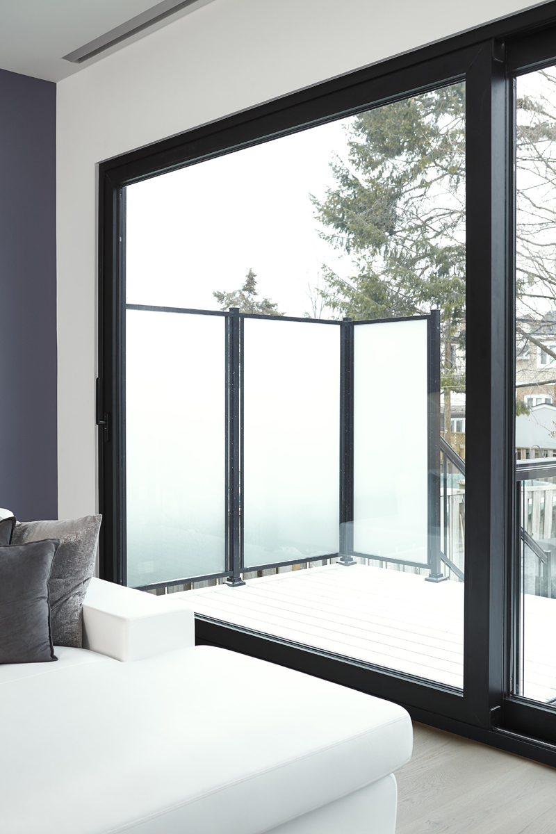 Swansea: Features included 14 ft ceilings on the main, high gloss kitchen millwork and a Caesarstone clad fireplace plus 22 ft curtain window for the living room
