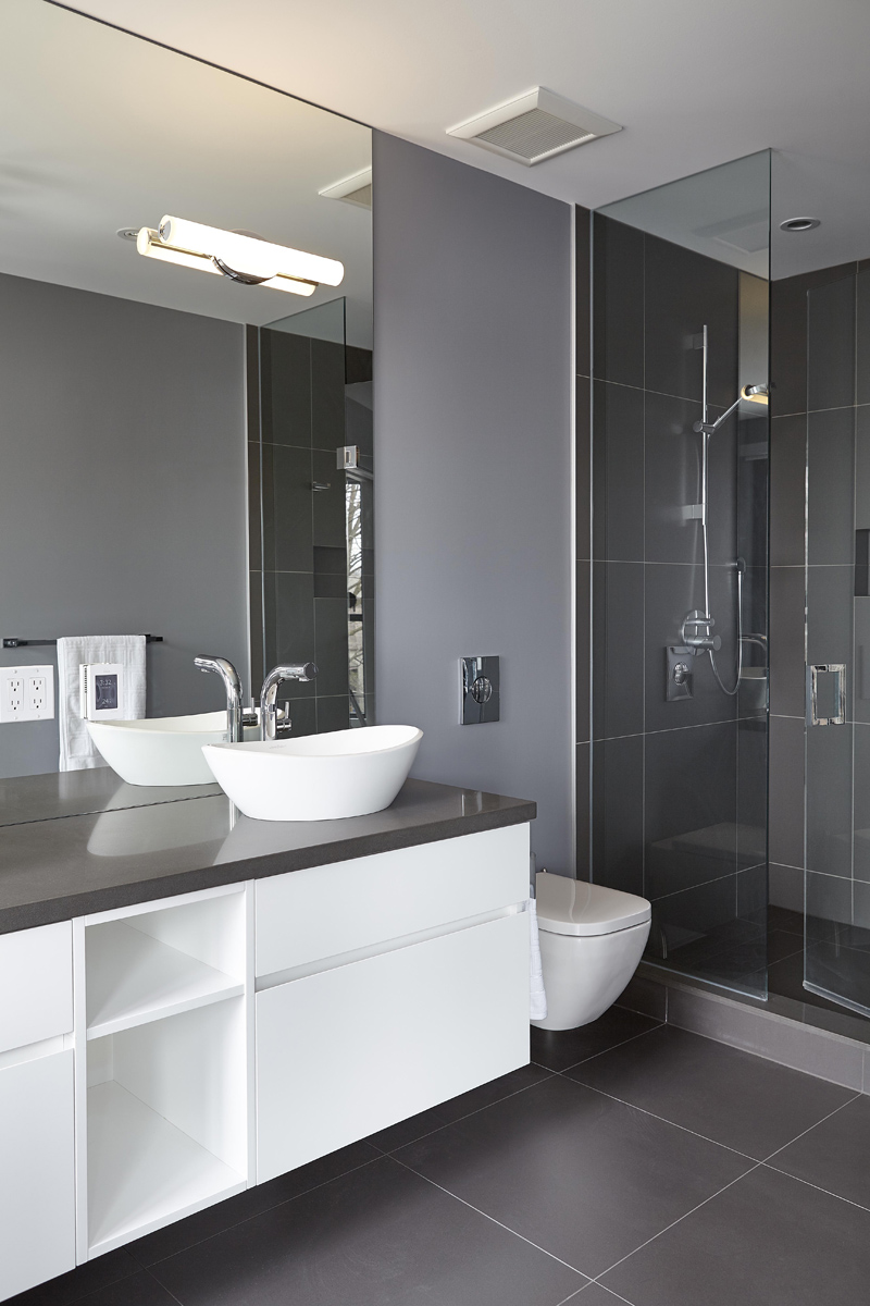 Swansea: Features included 14 ft ceilings on the main, high gloss kitchen millwork and a Caesarstone clad fireplace plus 22 ft curtain window for the living room