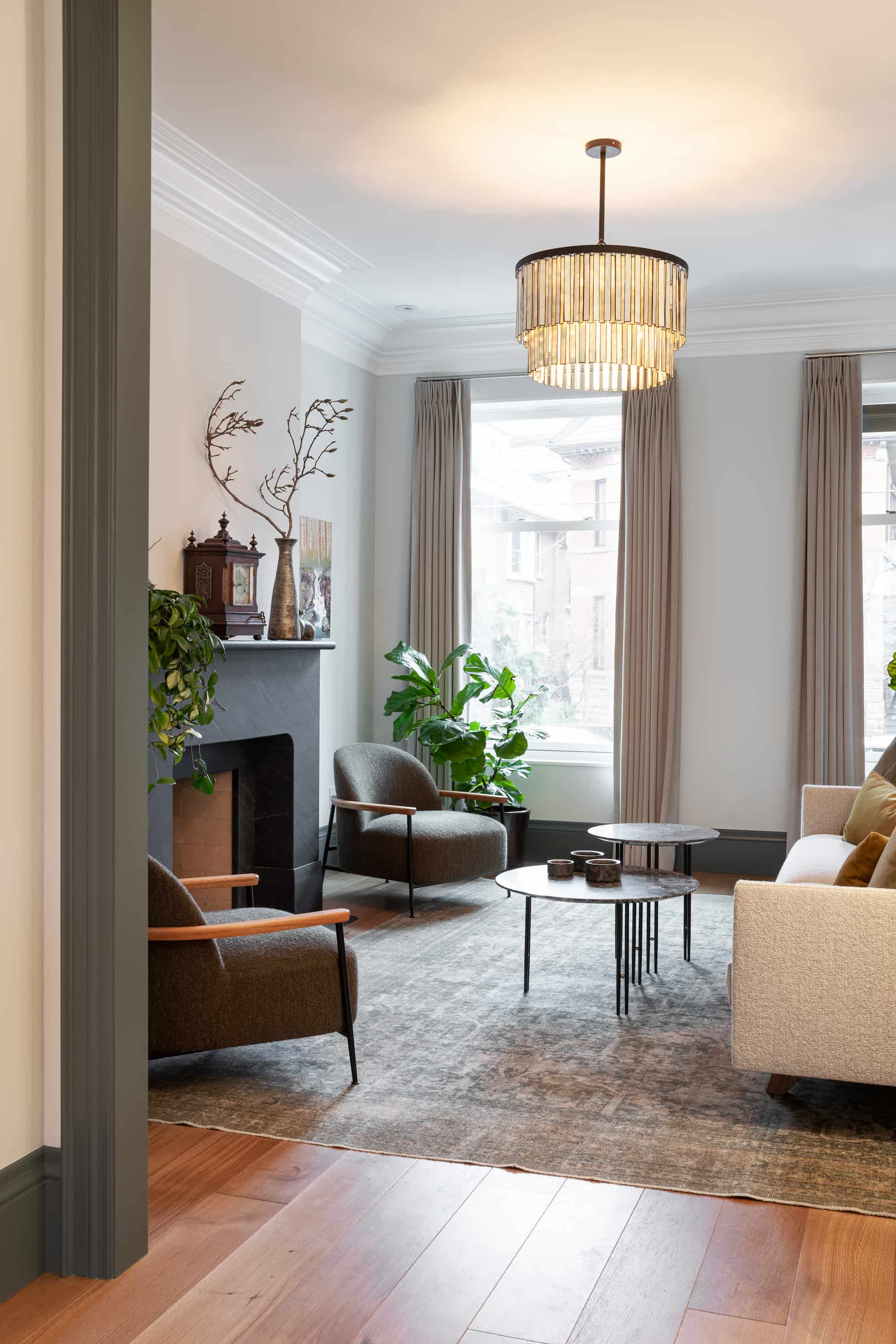 Astounding Annex: Behind its classic Annex exterior, this home now centers on a sage green kitchen finished with a dramatic full-height natural stone backsplash, its rust-and-teal veining picking up the warmth of the surrounding oak flooring
