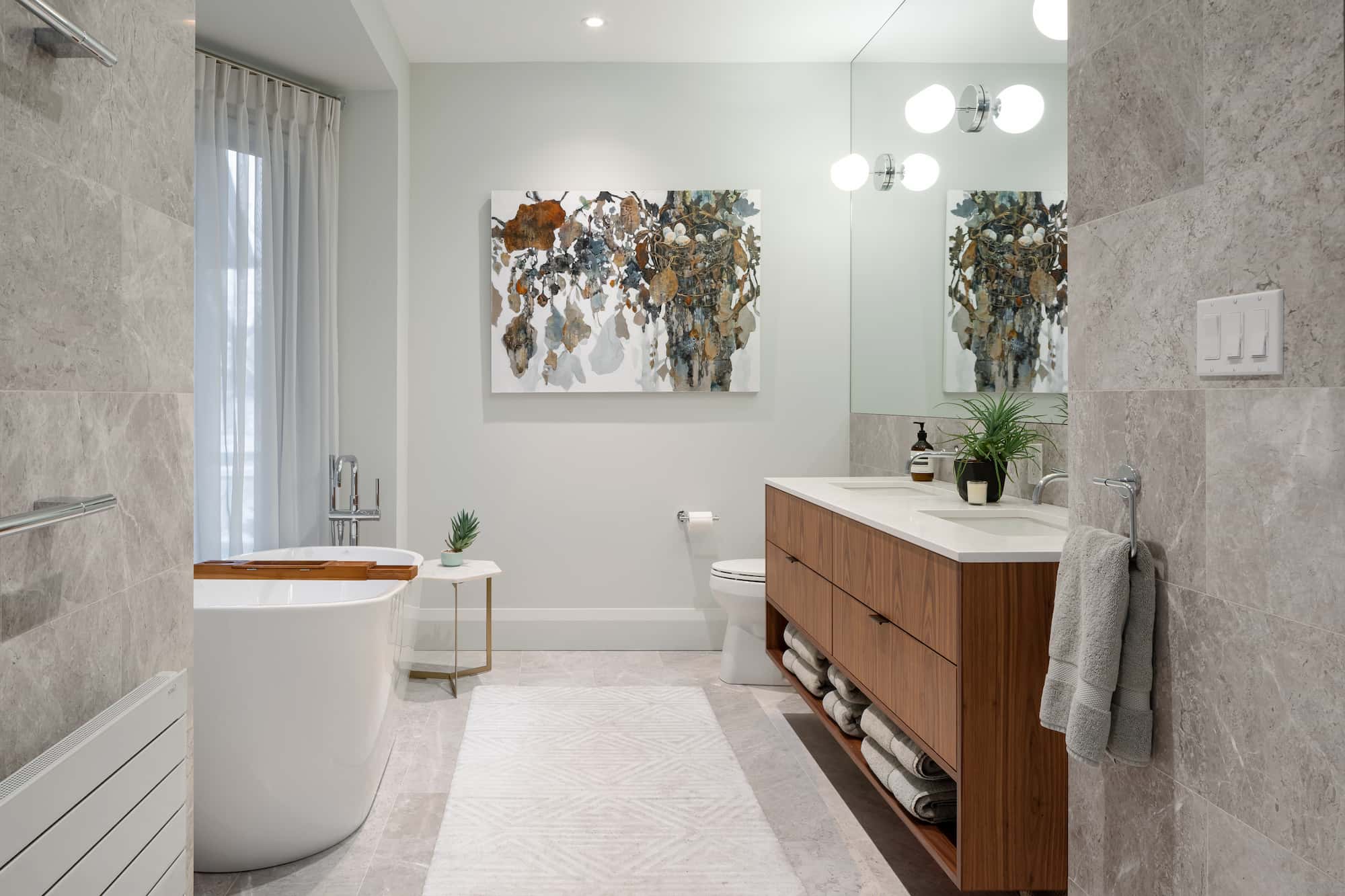 Astounding Annex: Behind its classic Annex exterior, this home now centers on a sage green kitchen finished with a dramatic full-height natural stone backsplash, its rust-and-teal veining picking up the warmth of the surrounding oak flooring