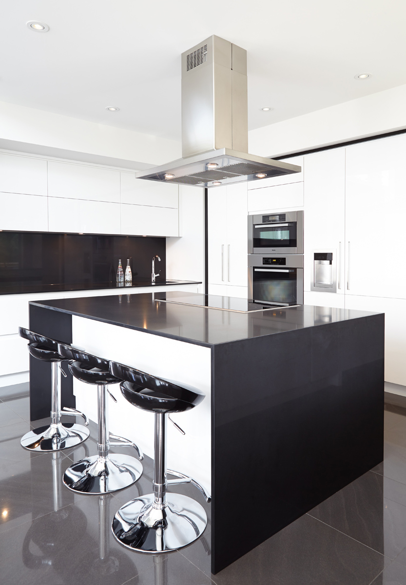 Contemporary Living: Brand new custom home with soaring ceiling heights, towering windows, clean modern lines, and a Neff kitchen