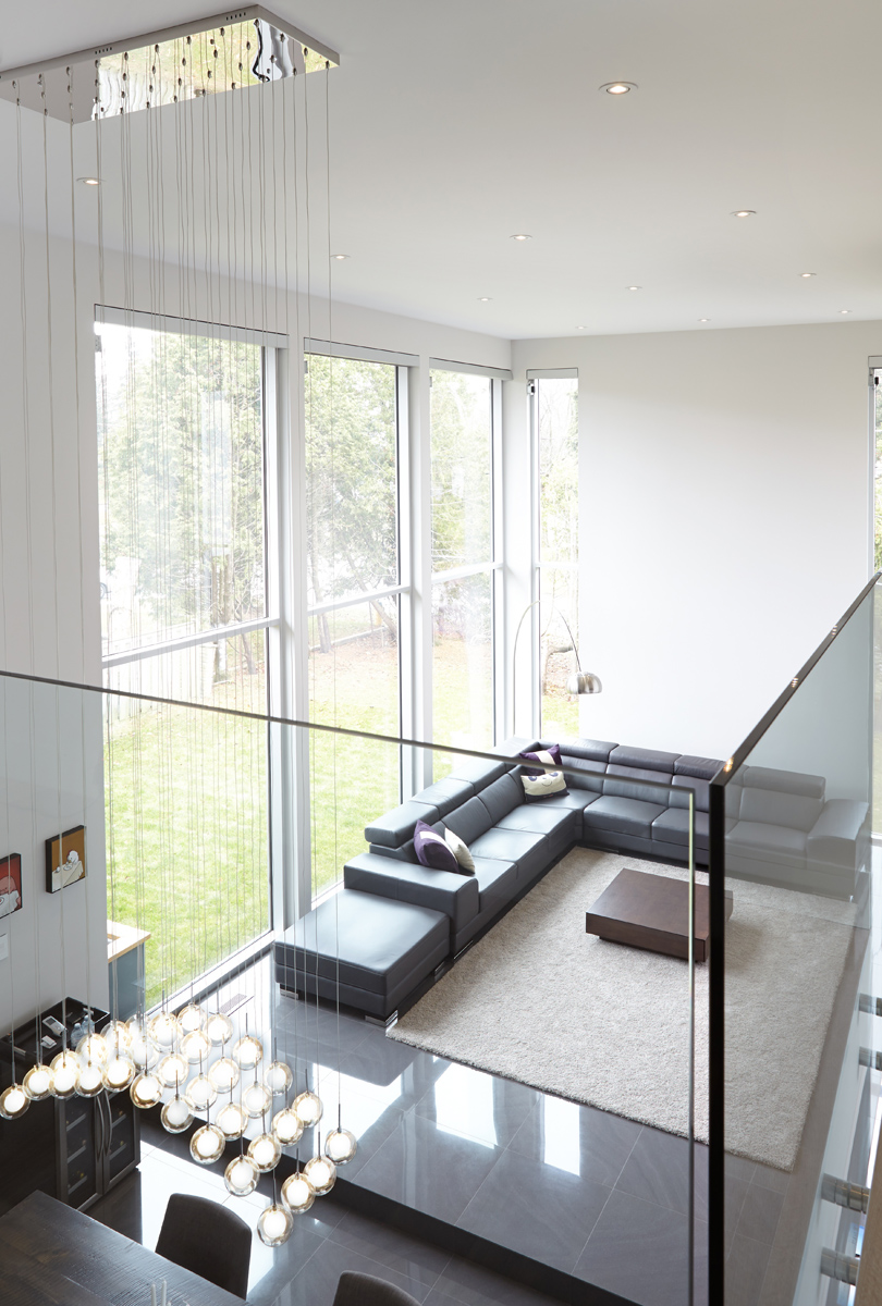 Contemporary Living: The exterior has a combination of cedar, stucco, and Hardi panel with anodized aluminum windows courtesy of Bigfoot