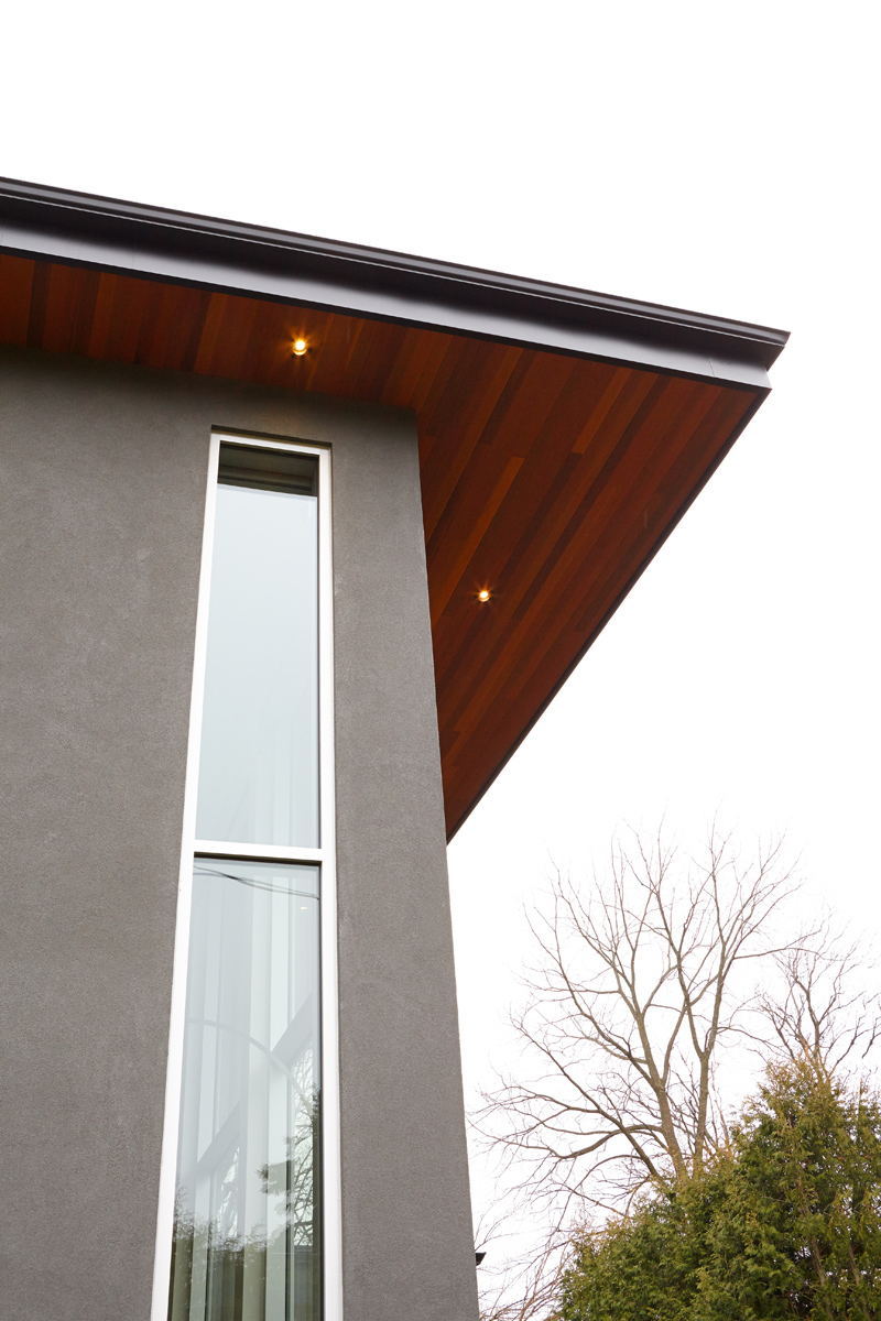 Contemporary Living: Brand new custom home with soaring ceiling heights, towering windows, clean modern lines, and a Neff kitchen