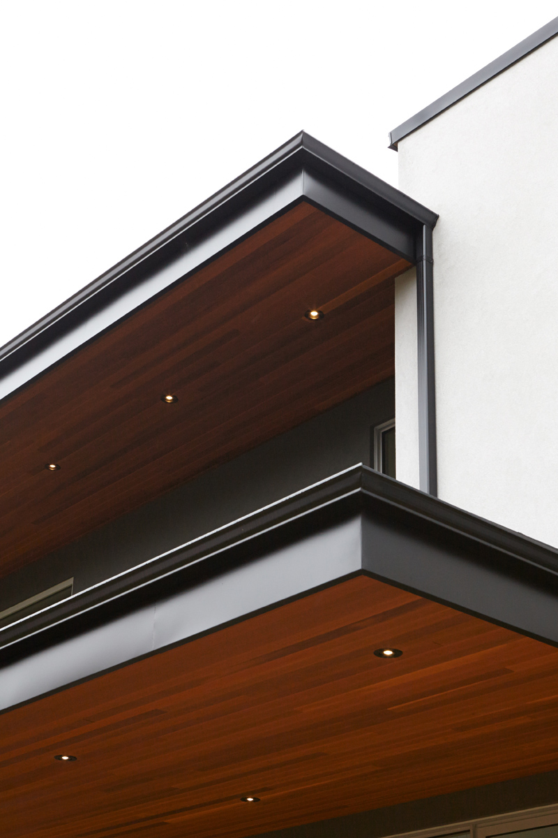 Contemporary Living: The exterior has a combination of cedar, stucco, and Hardi panel with anodized aluminum windows courtesy of Bigfoot