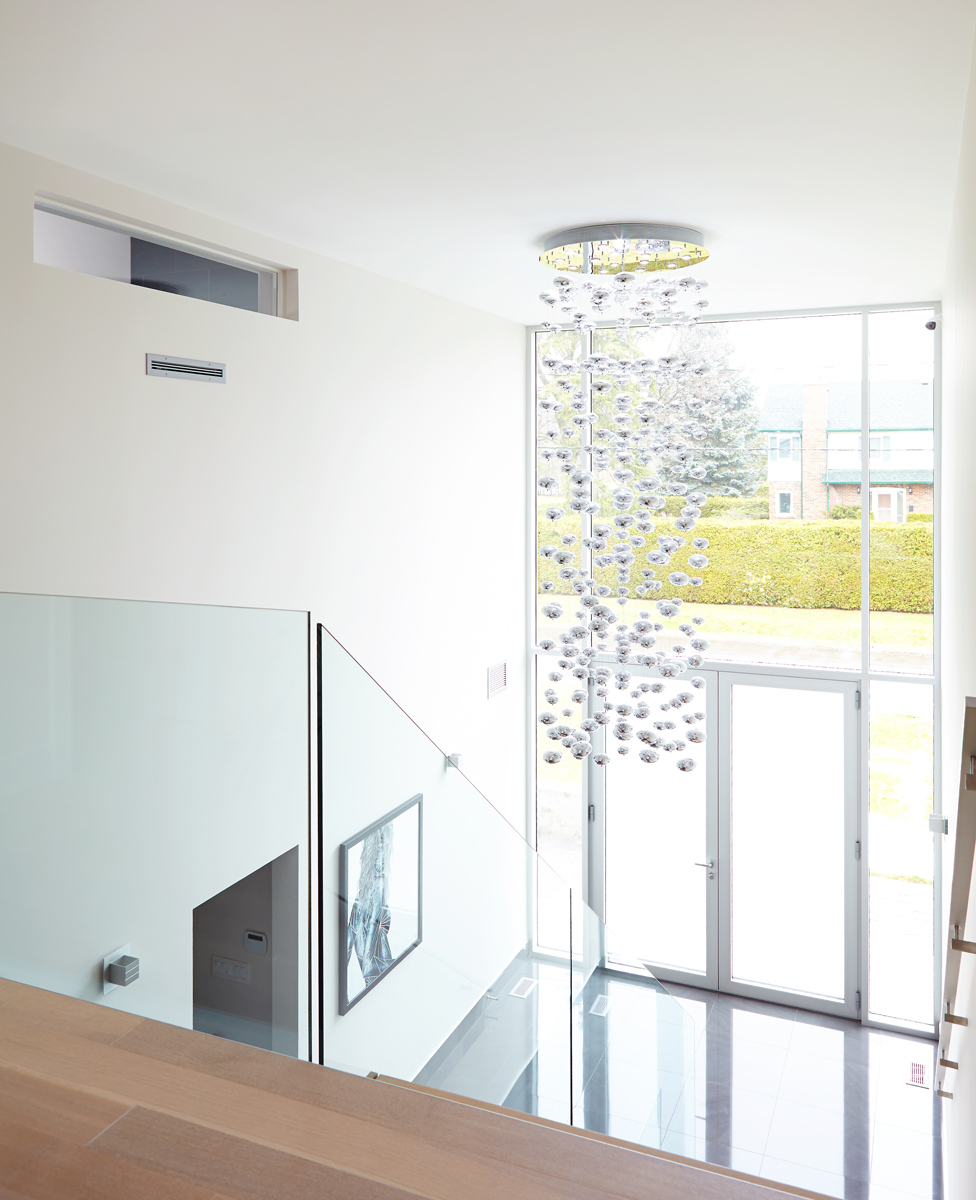 Contemporary Living: Brand new custom home with soaring ceiling heights, towering windows, clean modern lines, and a Neff kitchen