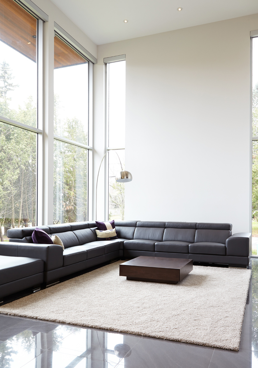 Contemporary Living: The exterior has a combination of cedar, stucco, and Hardi panel with anodized aluminum windows courtesy of Bigfoot