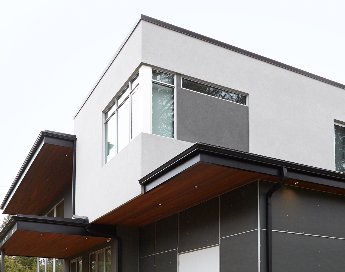 Contemporary Living: Brand new custom home with soaring ceiling heights, towering windows, clean modern lines, and a Neff kitchen
