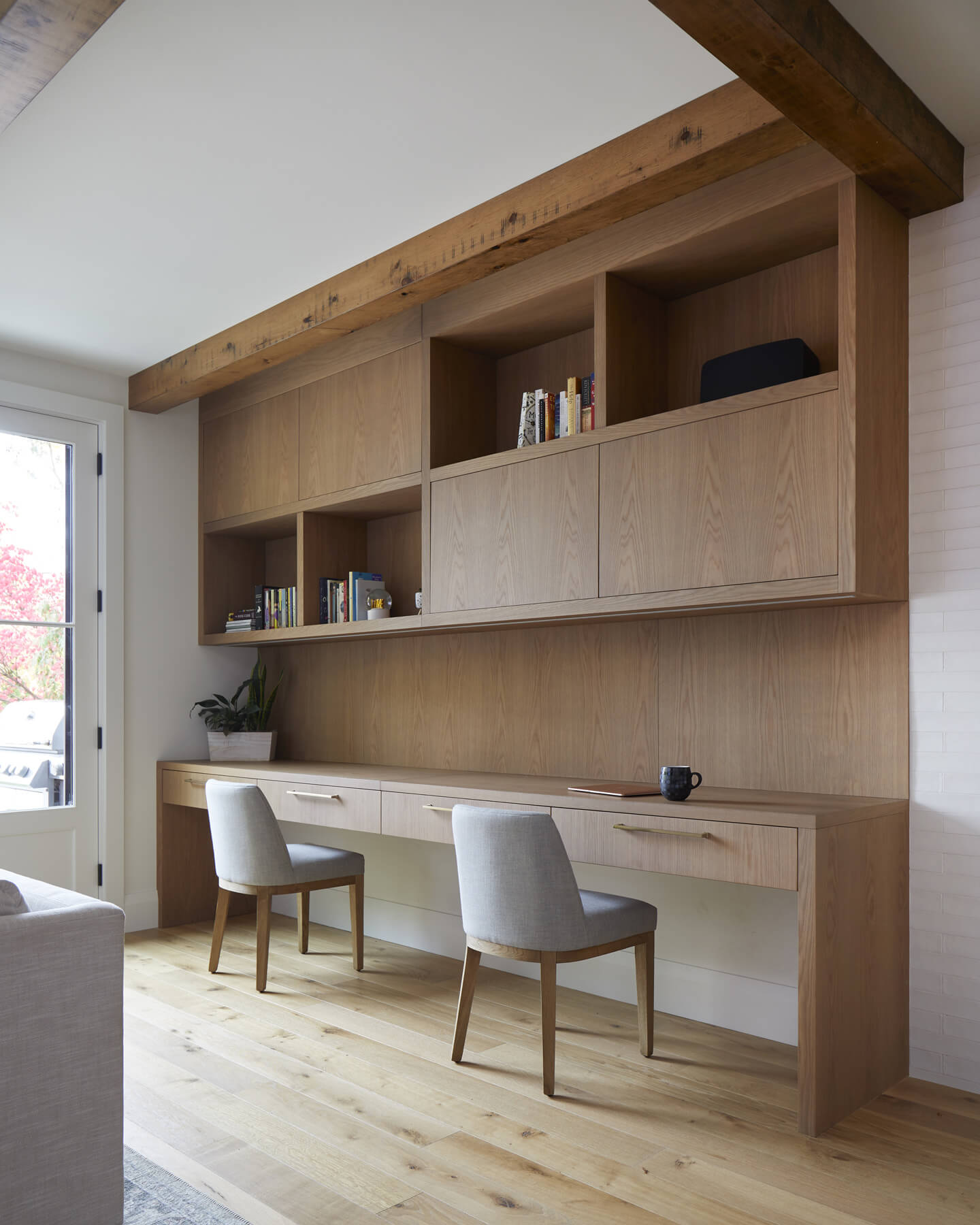 High Park-Swansea: Central to the success of this home is a welcoming oak/white kitchen and living space facing the backyard