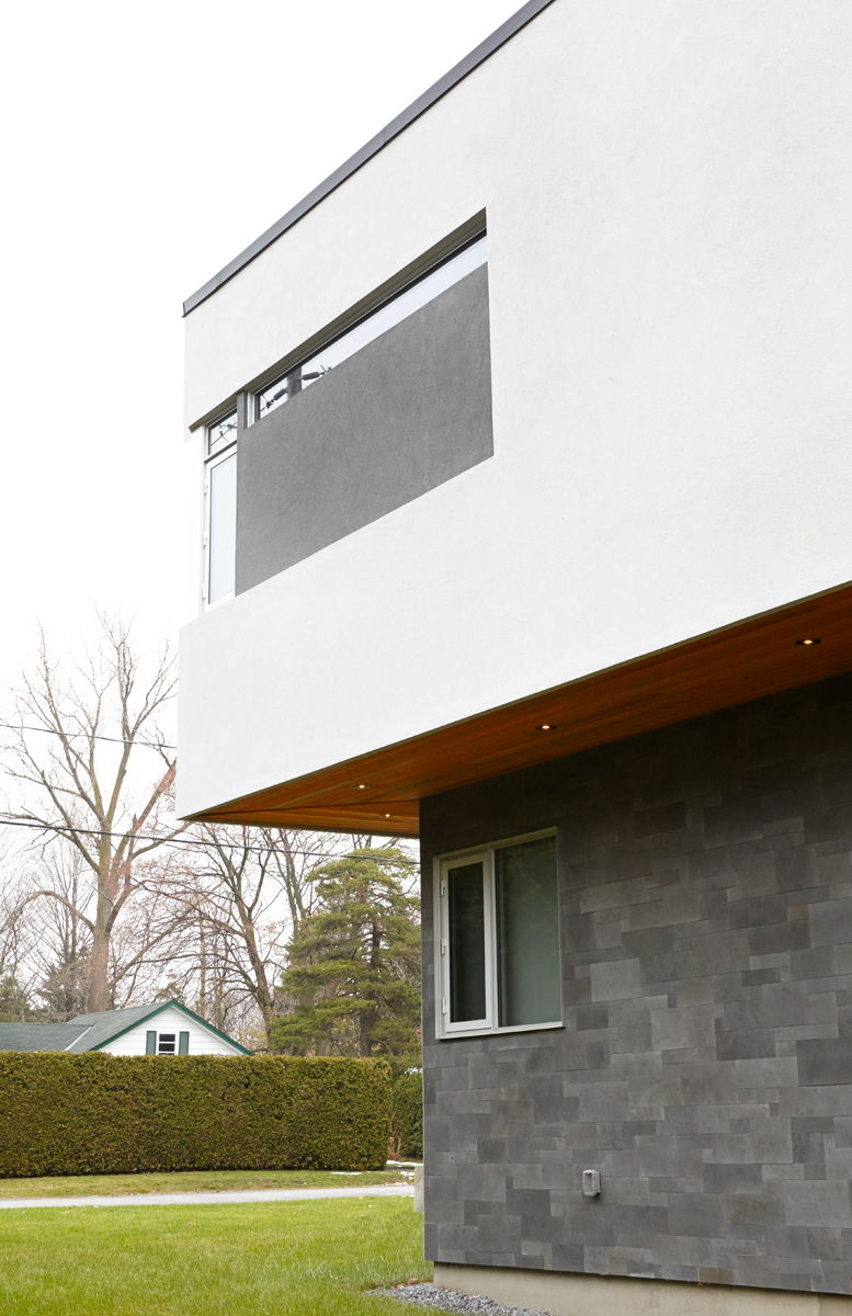 Contemporary Living: Brand new custom home with soaring ceiling heights, towering windows, clean modern lines, and a Neff kitchen