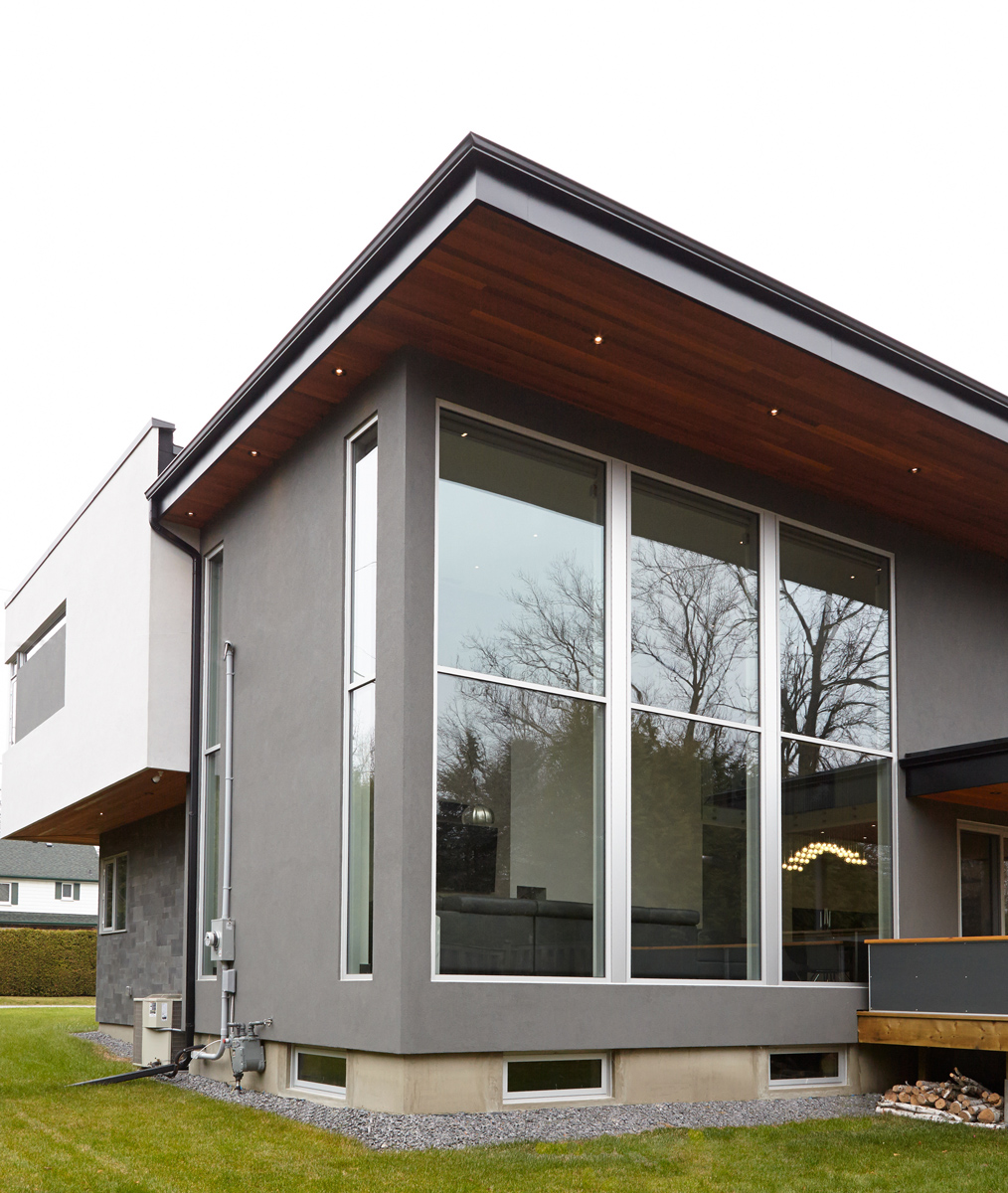 Contemporary Living: The exterior has a combination of cedar, stucco, and Hardi panel with anodized aluminum windows courtesy of Bigfoot