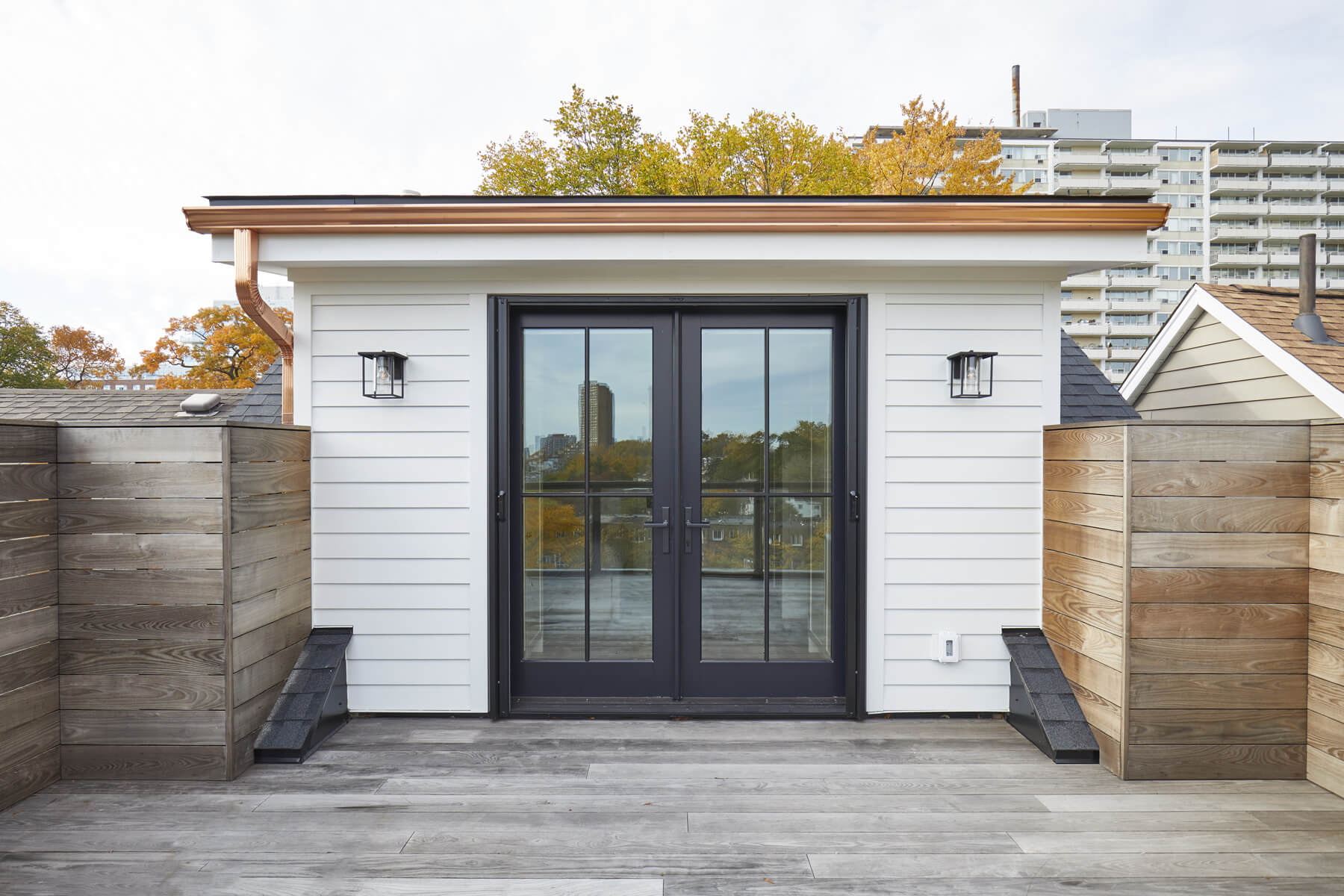 High Park-Swansea: Design elements include the use of white, black, wood and warm metals