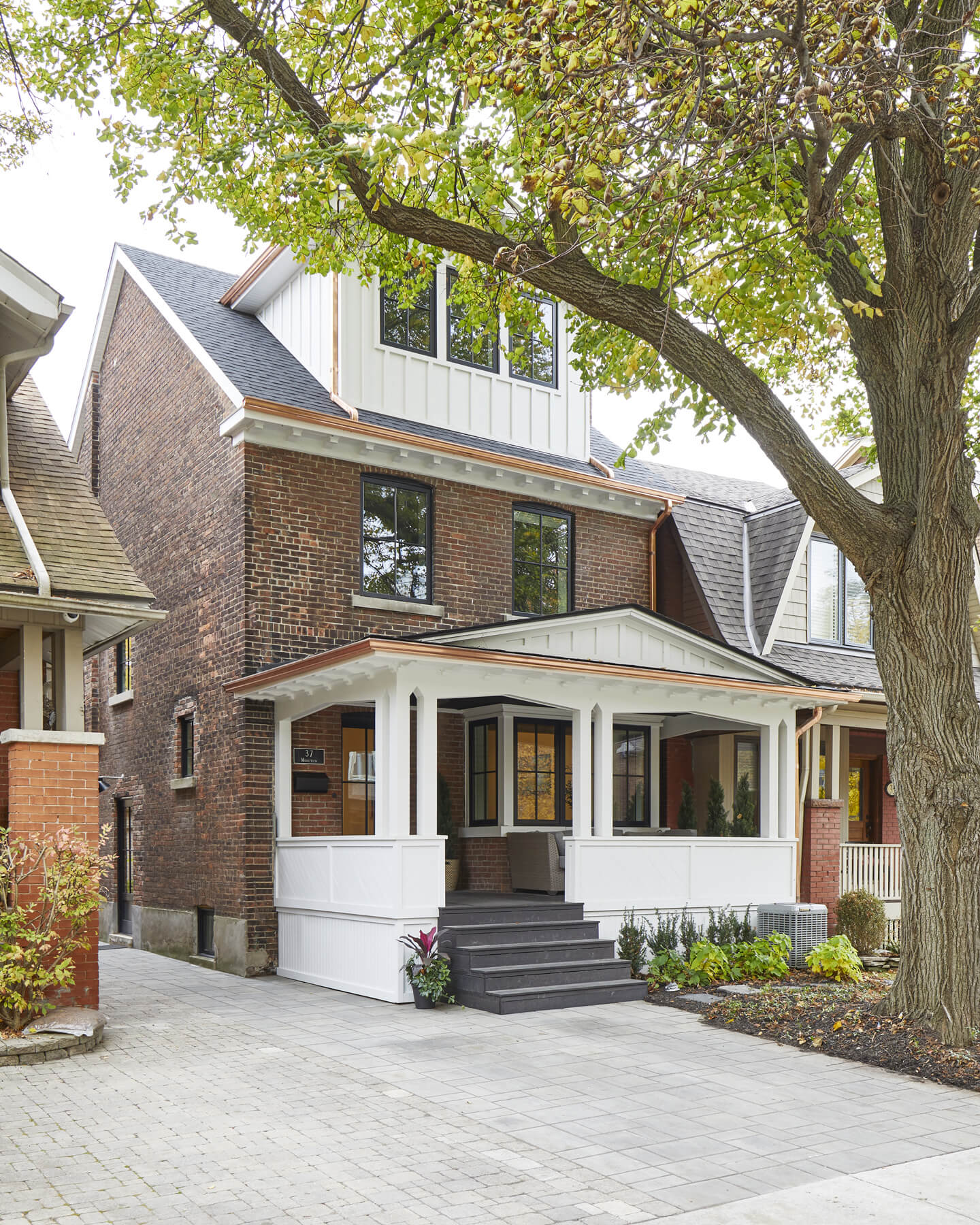 High Park-Swansea: Perched above High Park, this family home is a crisp and clean breath of fresh air!