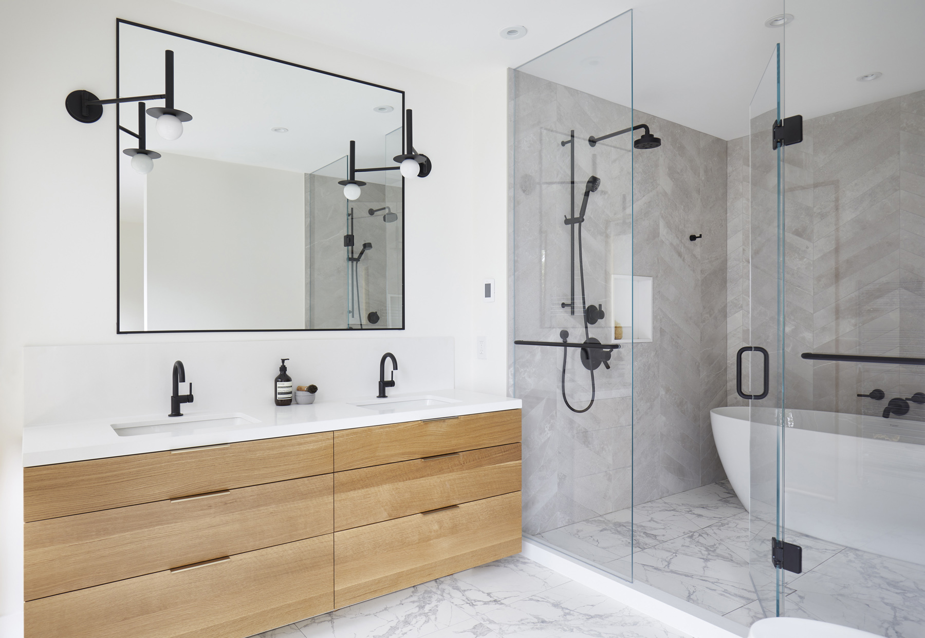 Roncesvalles Remodel: It features a curved leather banquette nestled in the bay window, floor to ceiling millwork with a full pantry, integrated appliances, panel ready Sub Zero and expansive storage