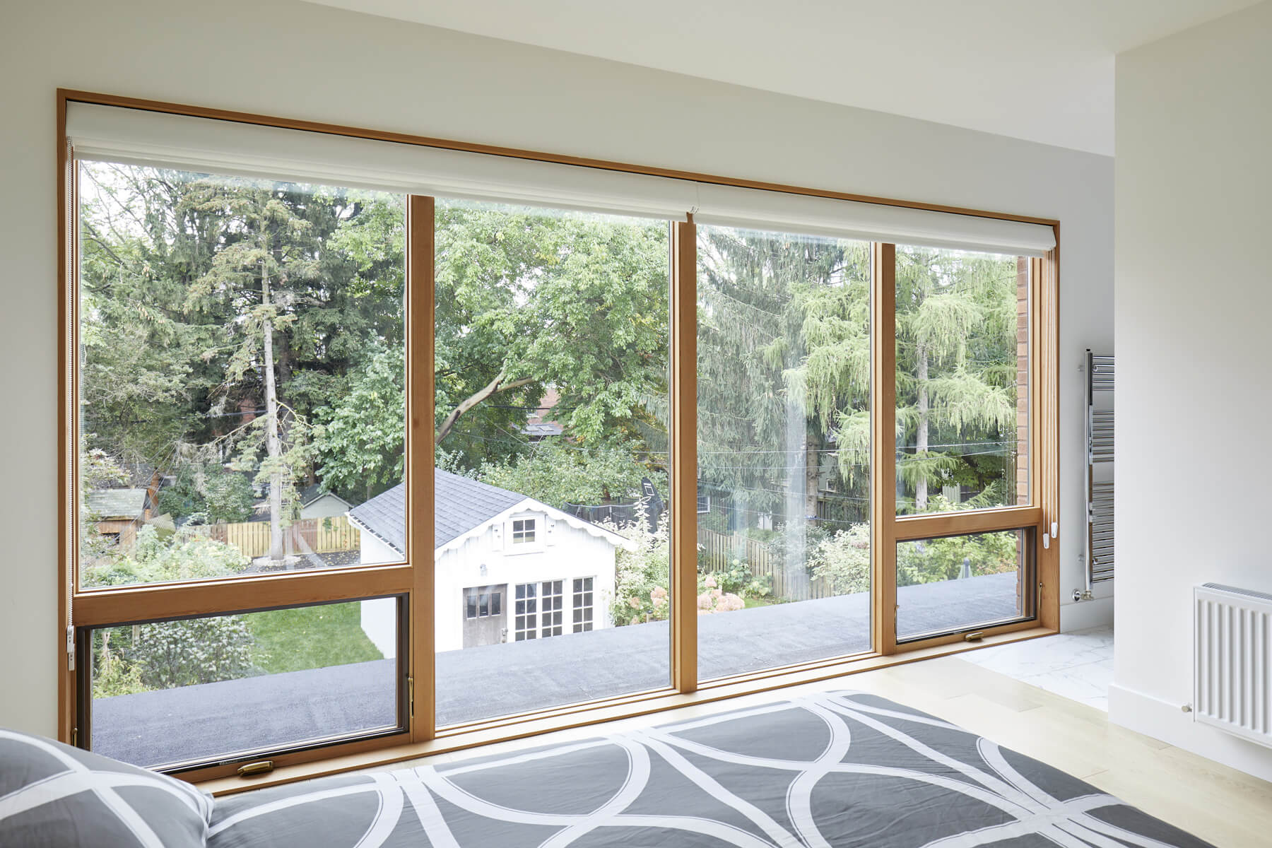 Roncesvalles Remodel: As a result, central to this renovation was the need to create a floor plan with a staircase to access all floors, space for a master bedroom and spacious ensuite on the second floor